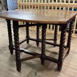 Wooden table with gateleg flaps