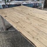 Washed-out wooden dining table