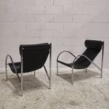 Pair of "Omega" armchairs, chrome-plated metal and leather, Habitat vintage 1980