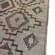 Vintage Touareg mat made of leather and reeds.