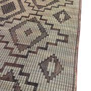 Vintage Touareg mat made of leather and reeds.