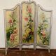 Screen has three Louis XV style panels in patinated wood XX century