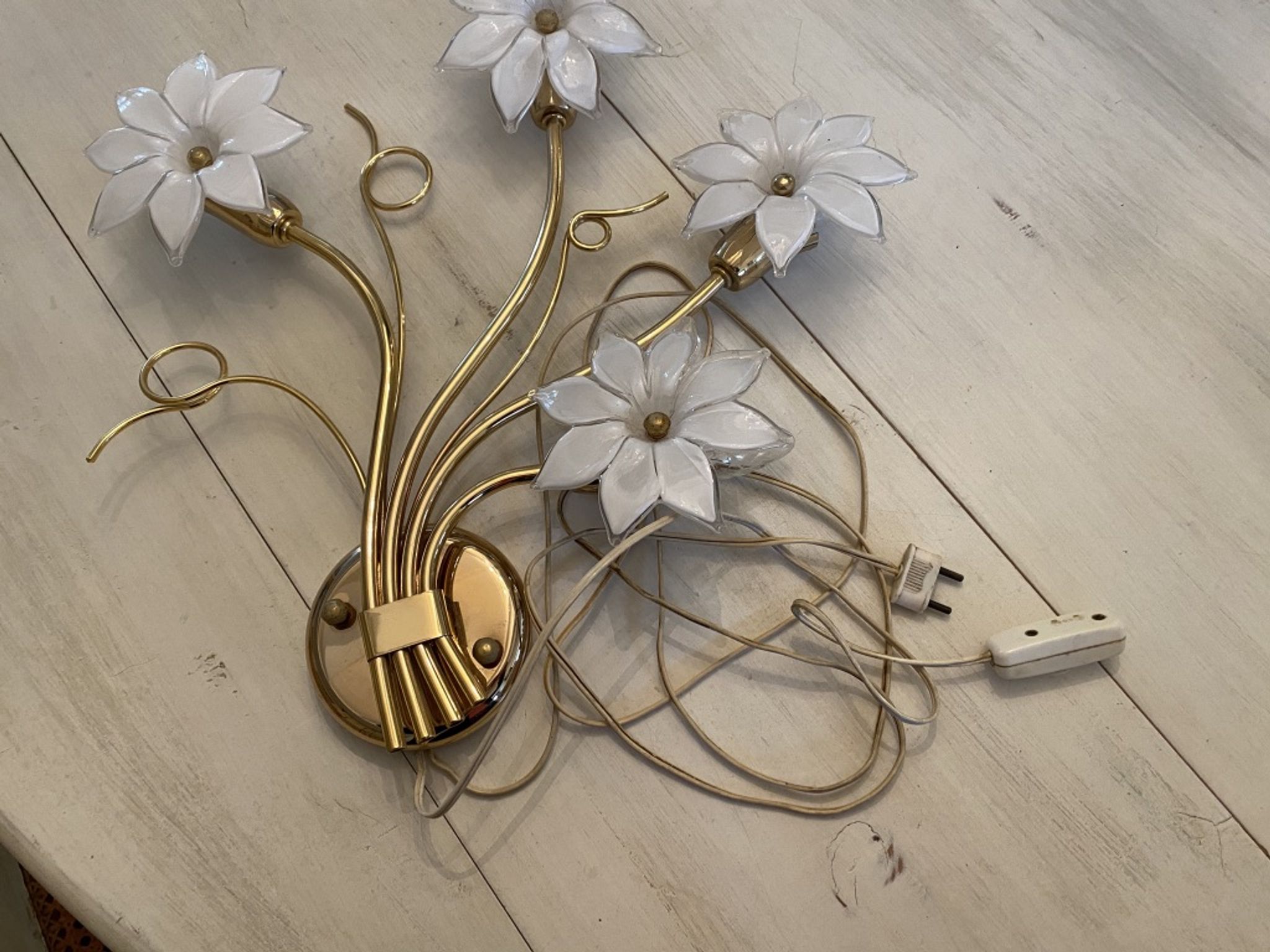 Glass and gold metal wall light