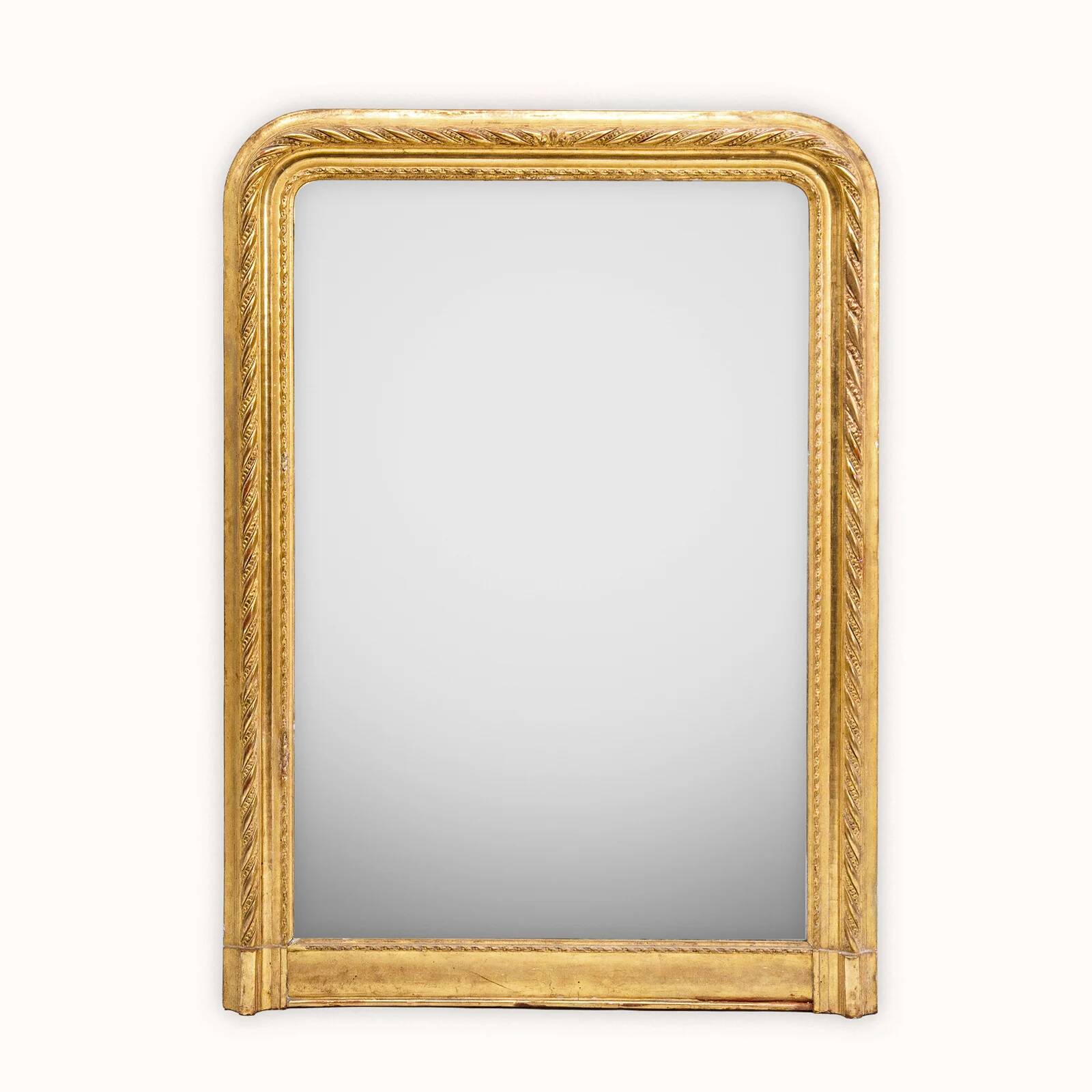 19th-century patinated mirror with a ribbon-style frame