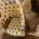 Office chair known as a presidential chair in mahogany and cognac leather.