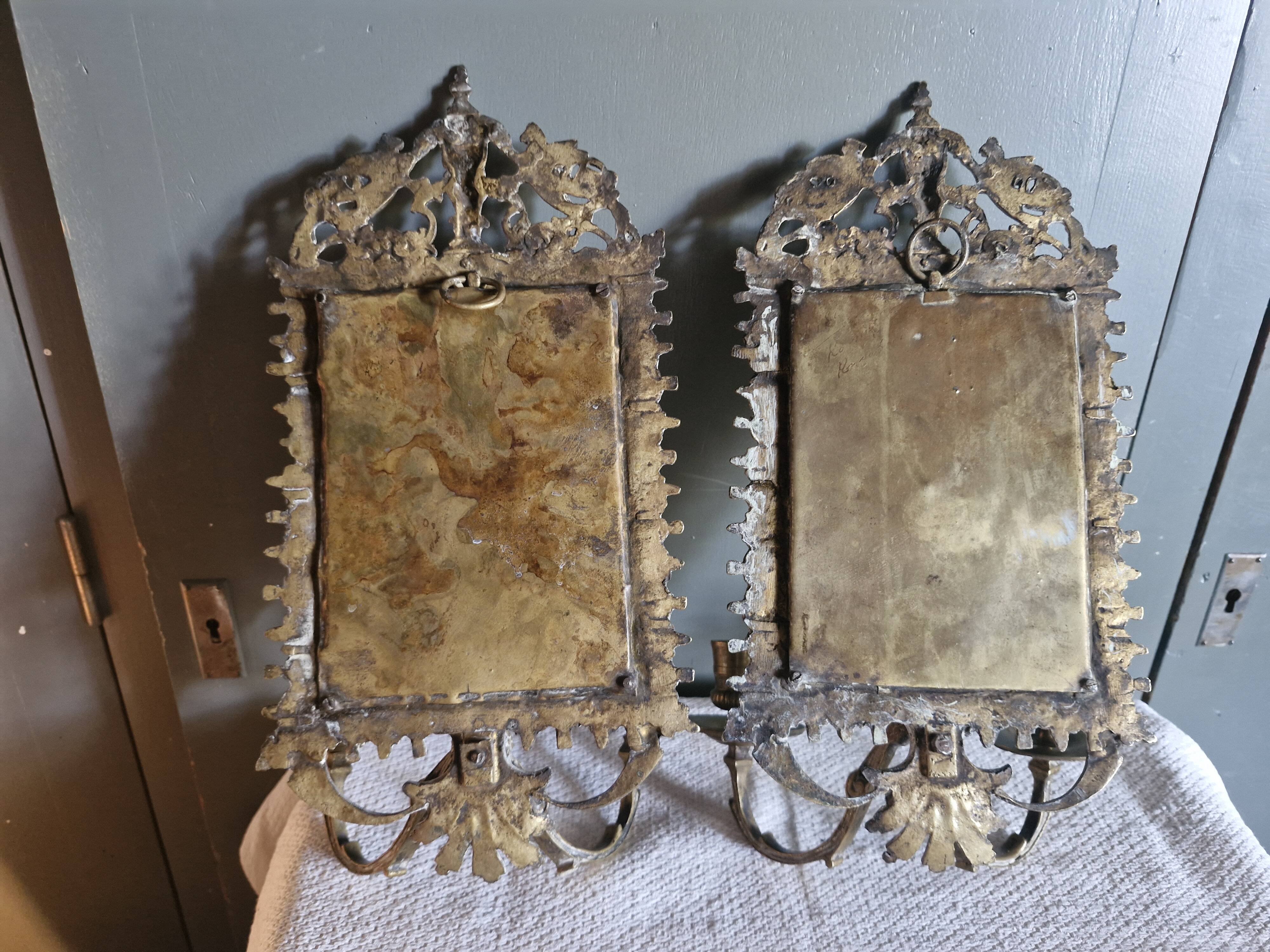 Pair of mirror sconces/candle holders in 19th-century bronze.