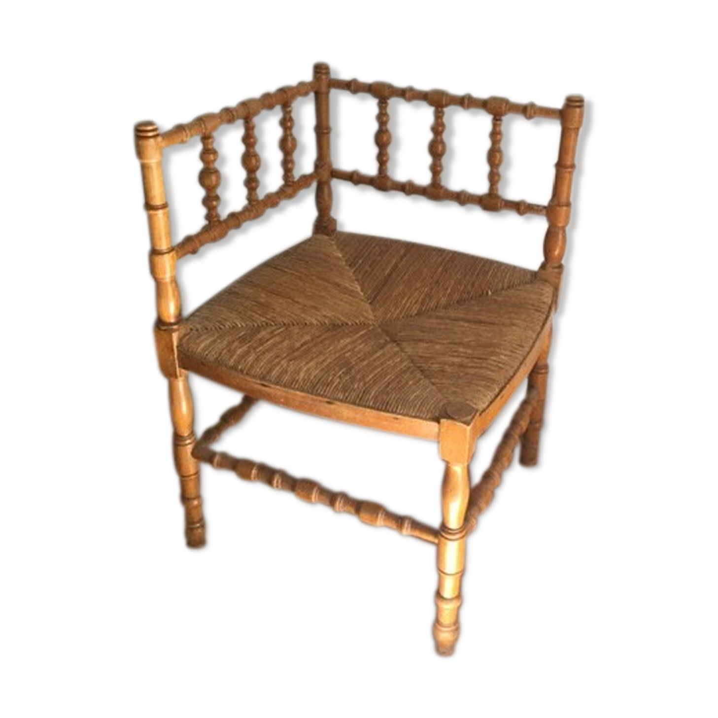 Turned wooden fire corner armchair, mulched seat