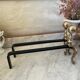 Old pair of brass andirons