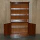 Open library Bradley Furniture made of yew wood with a cupboard base.
