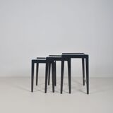 Tables gigognes en bois teinté noir et plateau en verre, années 1960