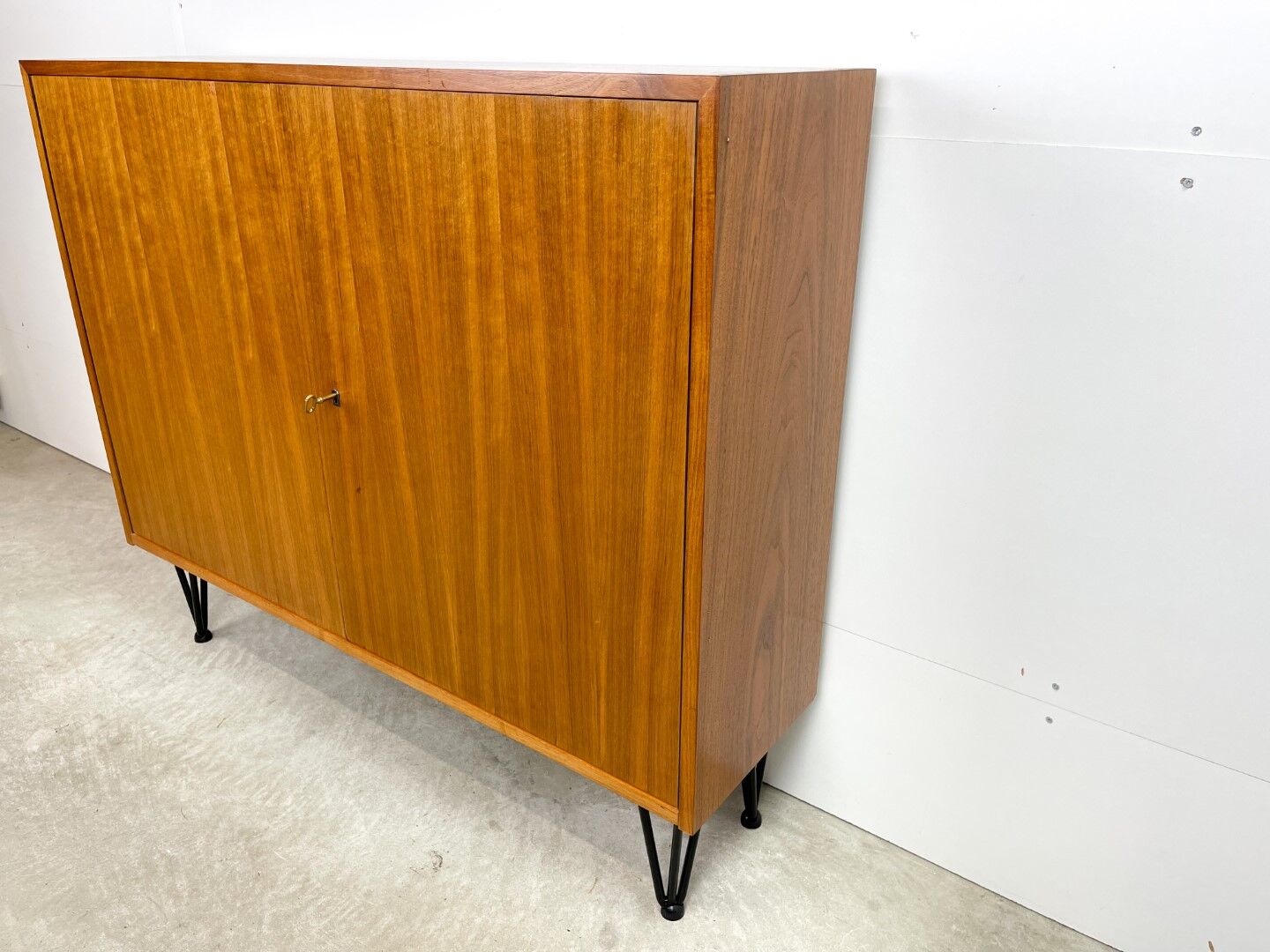 High vintage cabinet with hairpin legs