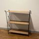 Rattan and wrought iron shelf