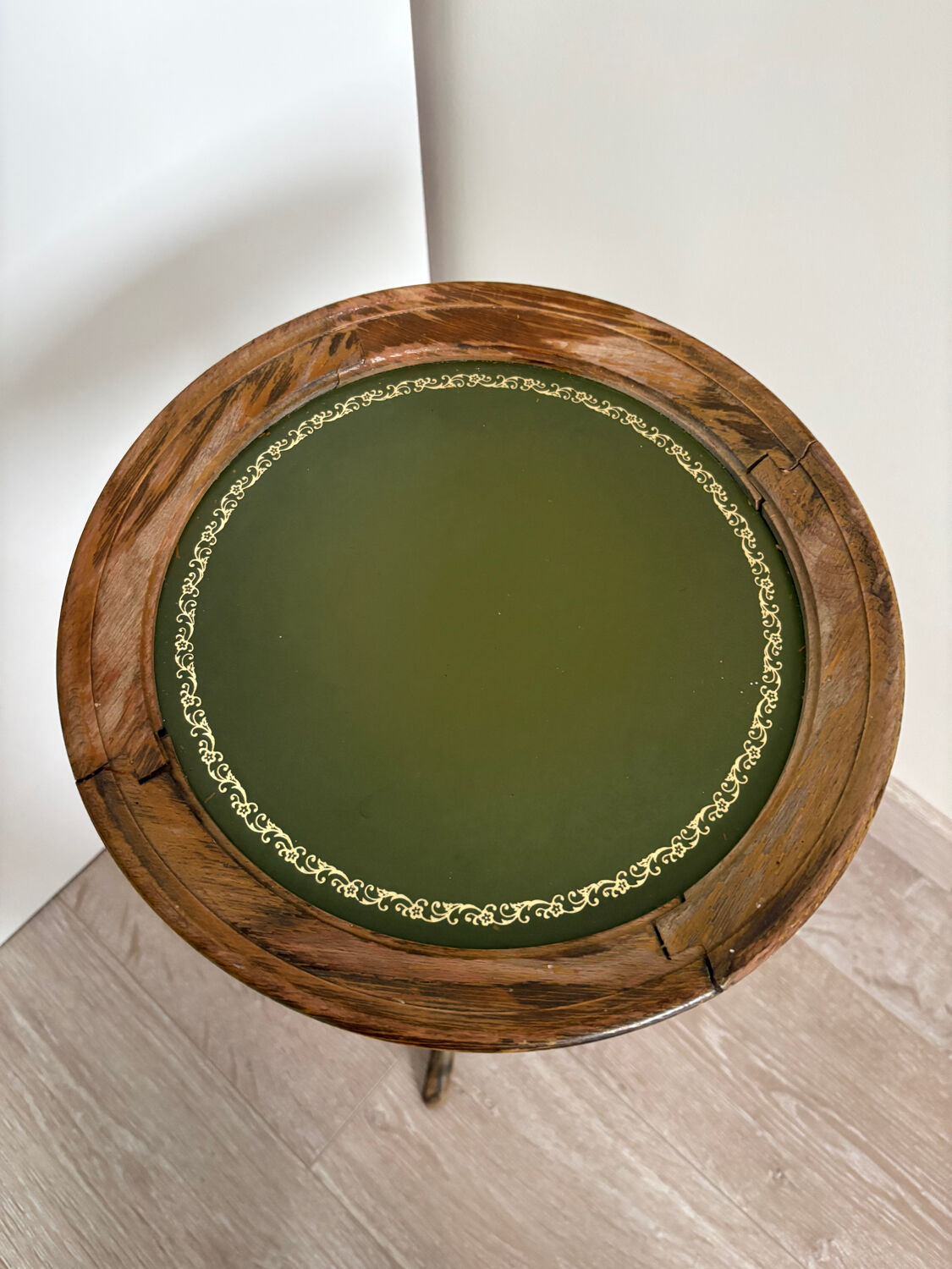 Antique wooden gueridon – green leather top with gold detailing – early 20th century