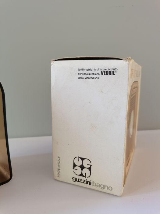 Guzzini sconce by Makio Nasuike