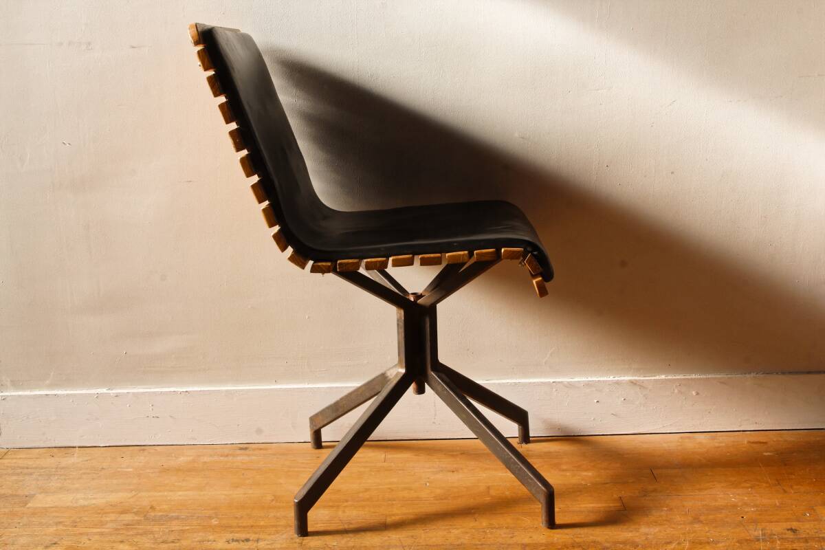 Handcrafted chair, laminated wood and leather