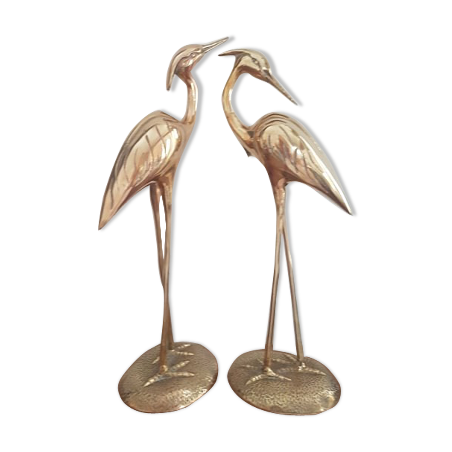 Pair of birds couple of brass herons