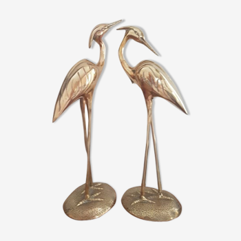 Pair of birds couple of brass herons