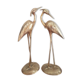 Pair of birds couple of brass herons