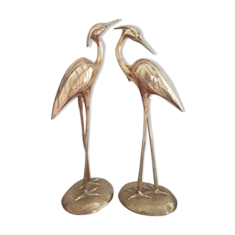 Pair of birds couple of brass herons