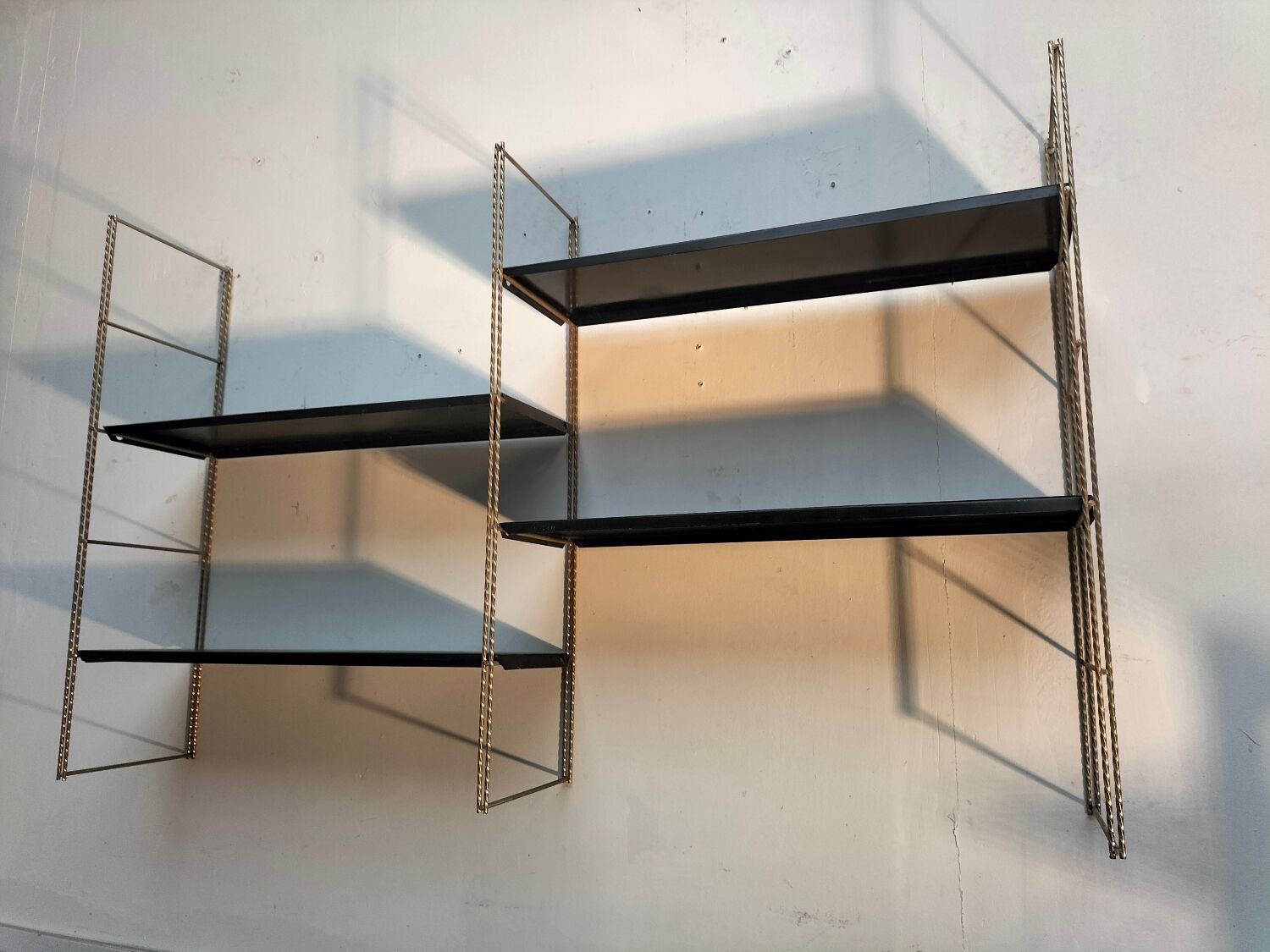 Metal wall shelf