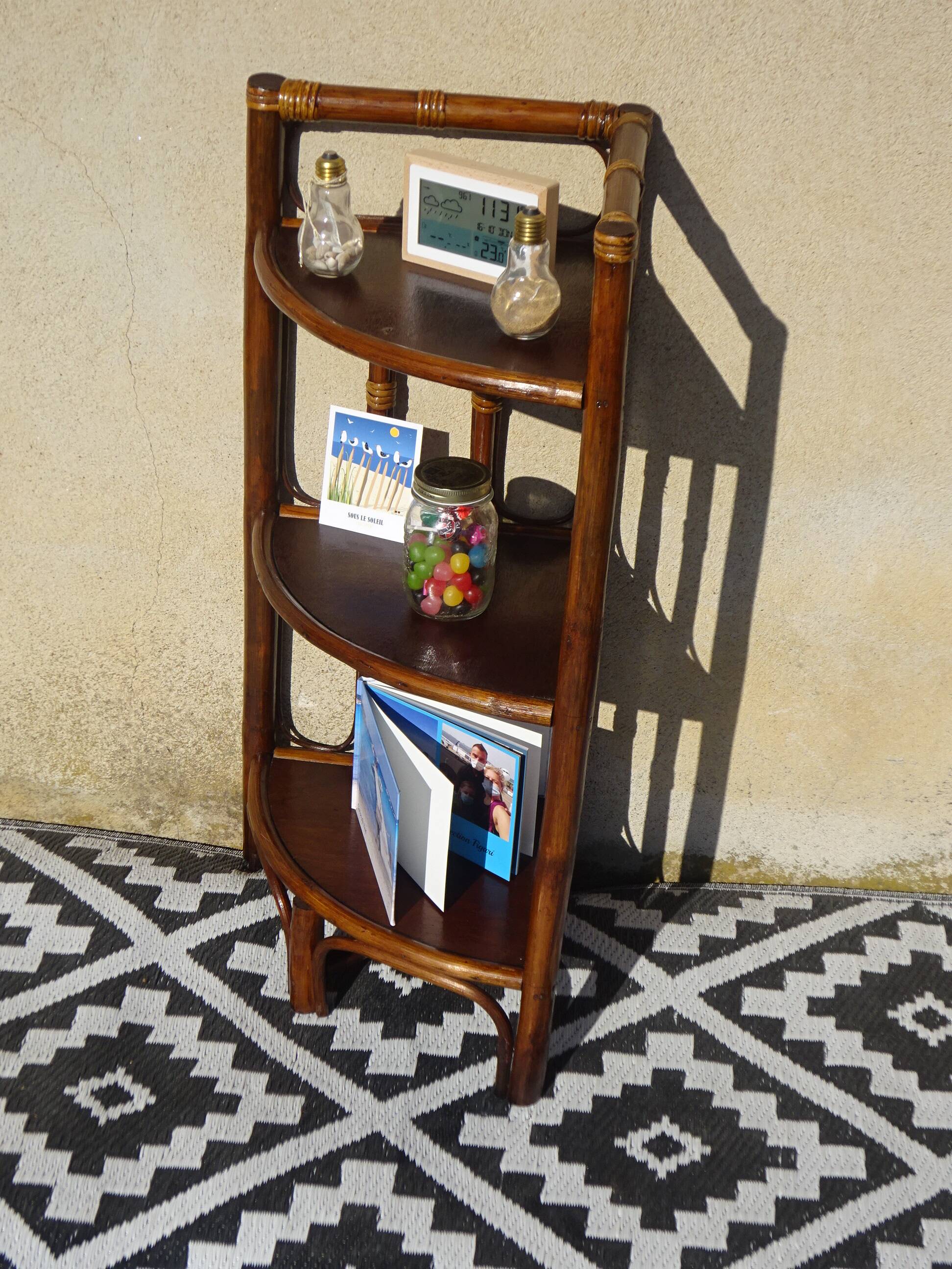 Rattan and bamboo bedside tables, both.