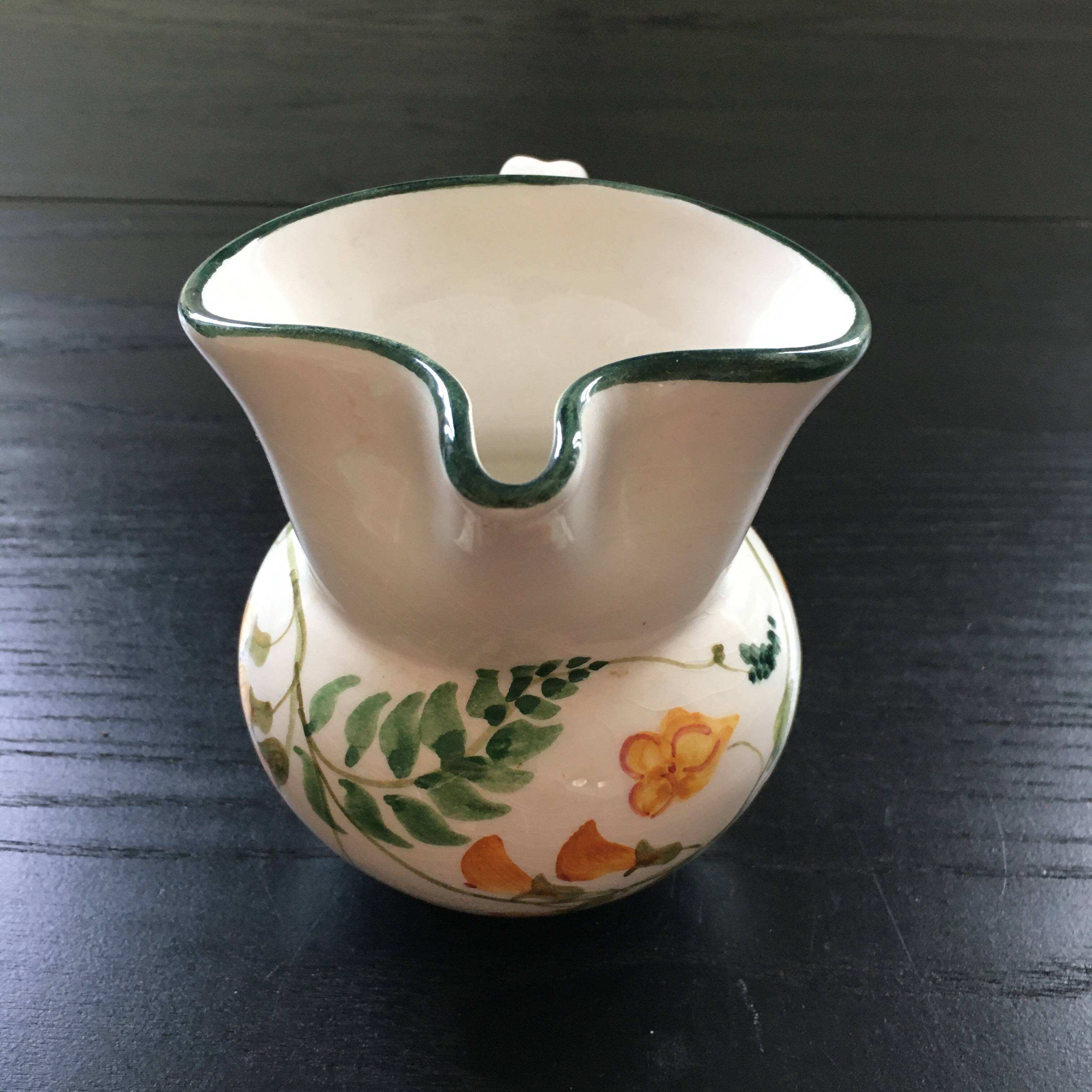 Small pitcher with floral decoration