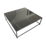Coffee table with ceramic top and wrought iron base