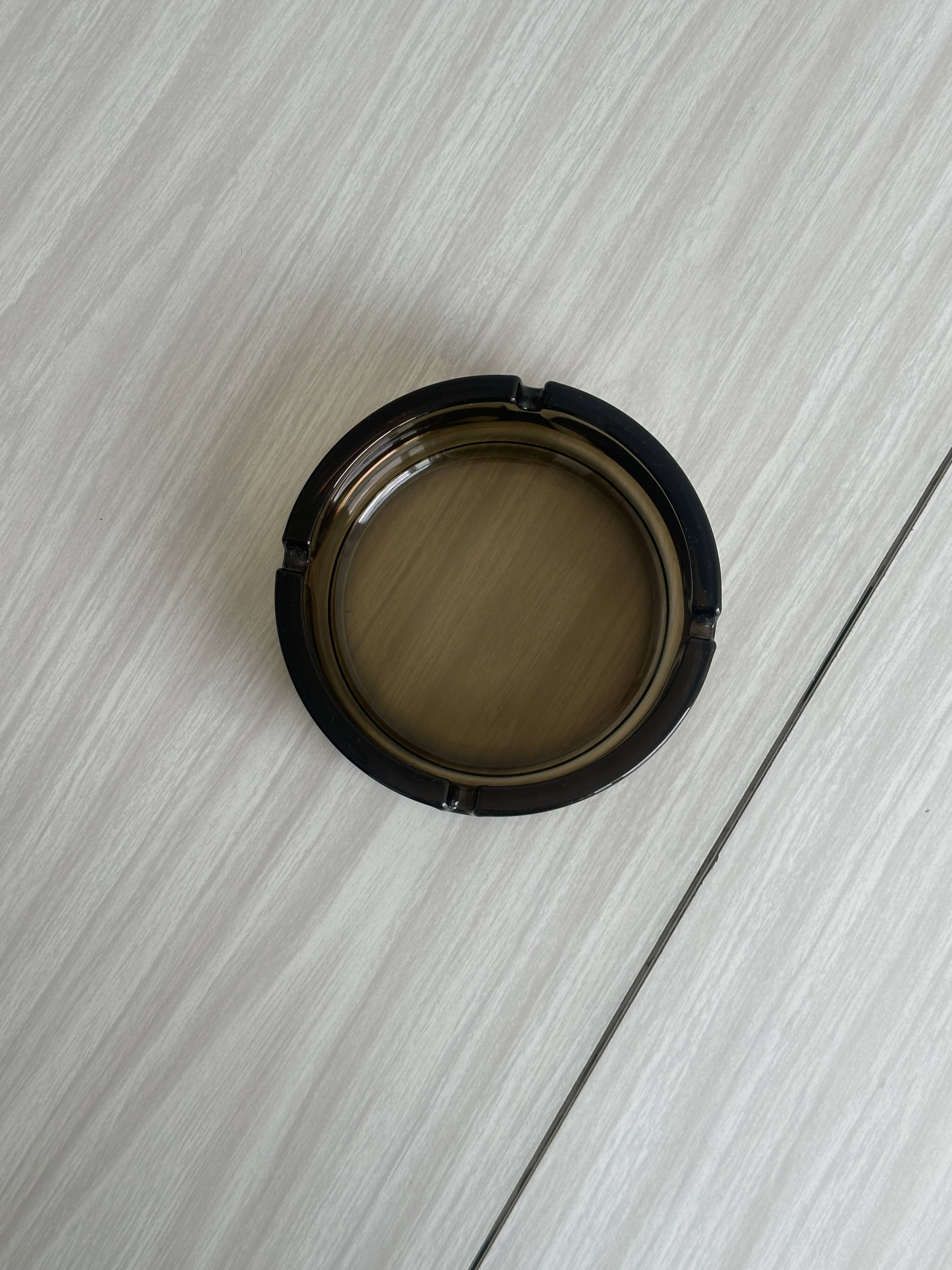 Thick smoked glass ashtray