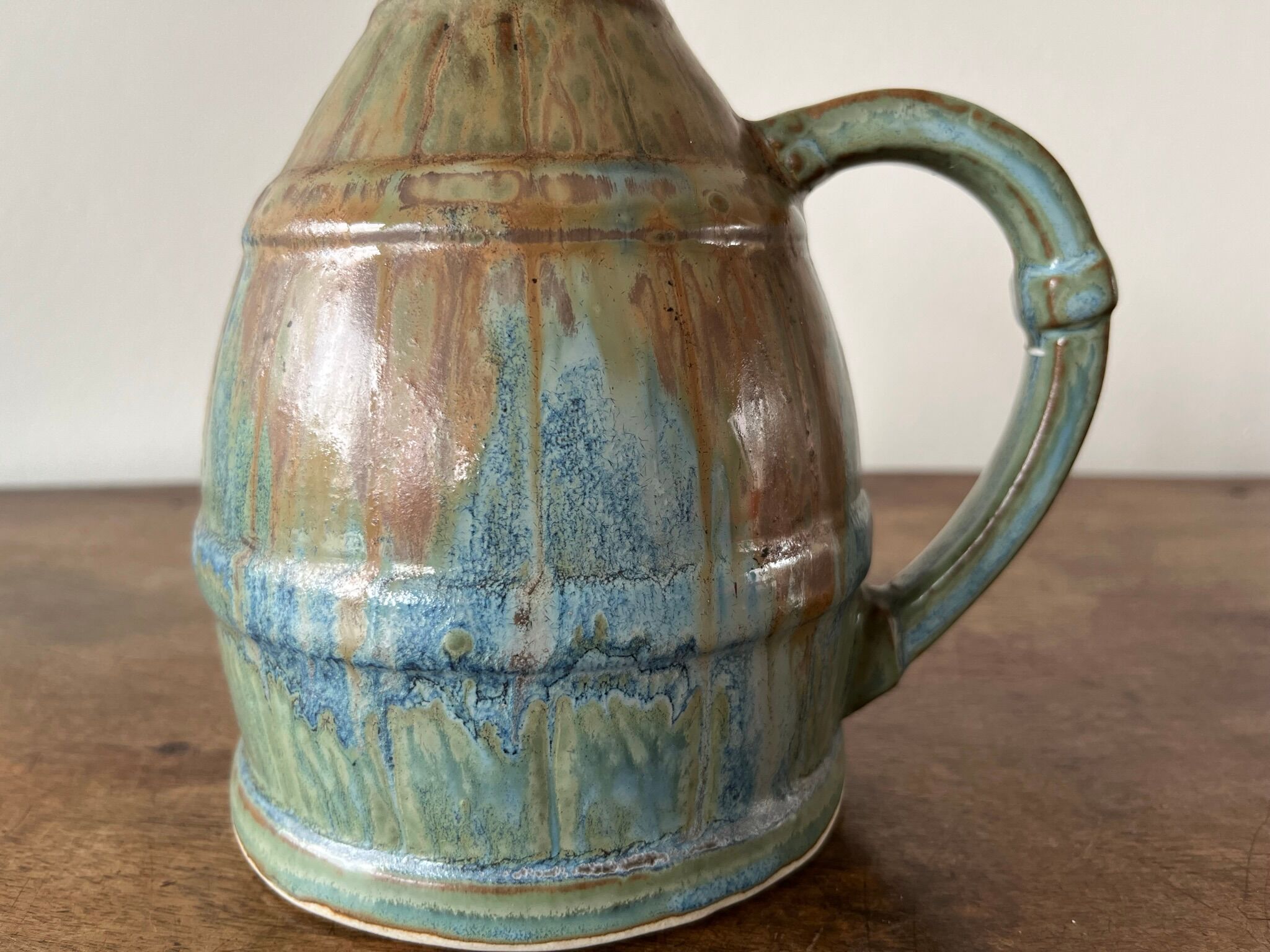Pitcher in flamed sandstone