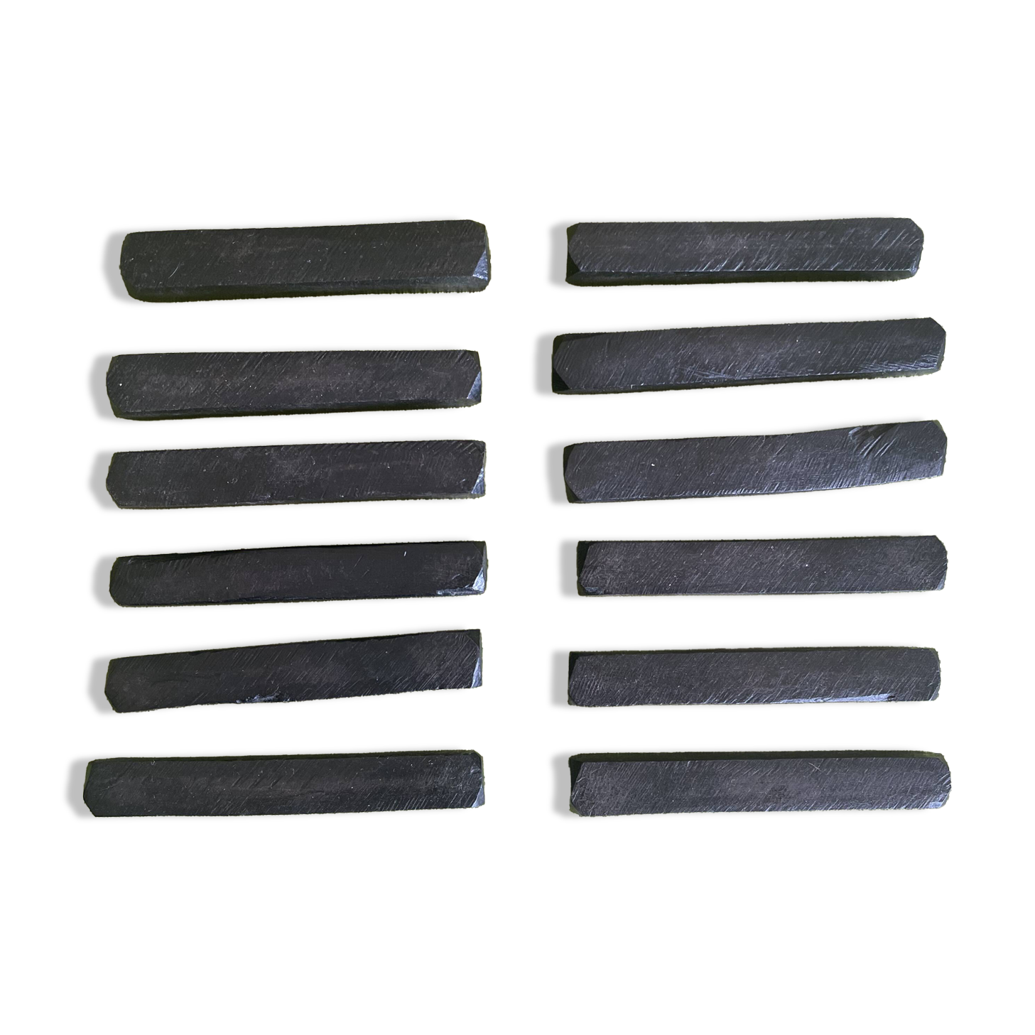 Set of 12 vintage ebony knife rests