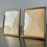 Pair of gold colored  metal art deco picture frames