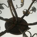 Brass chandelier and porcelain flowers