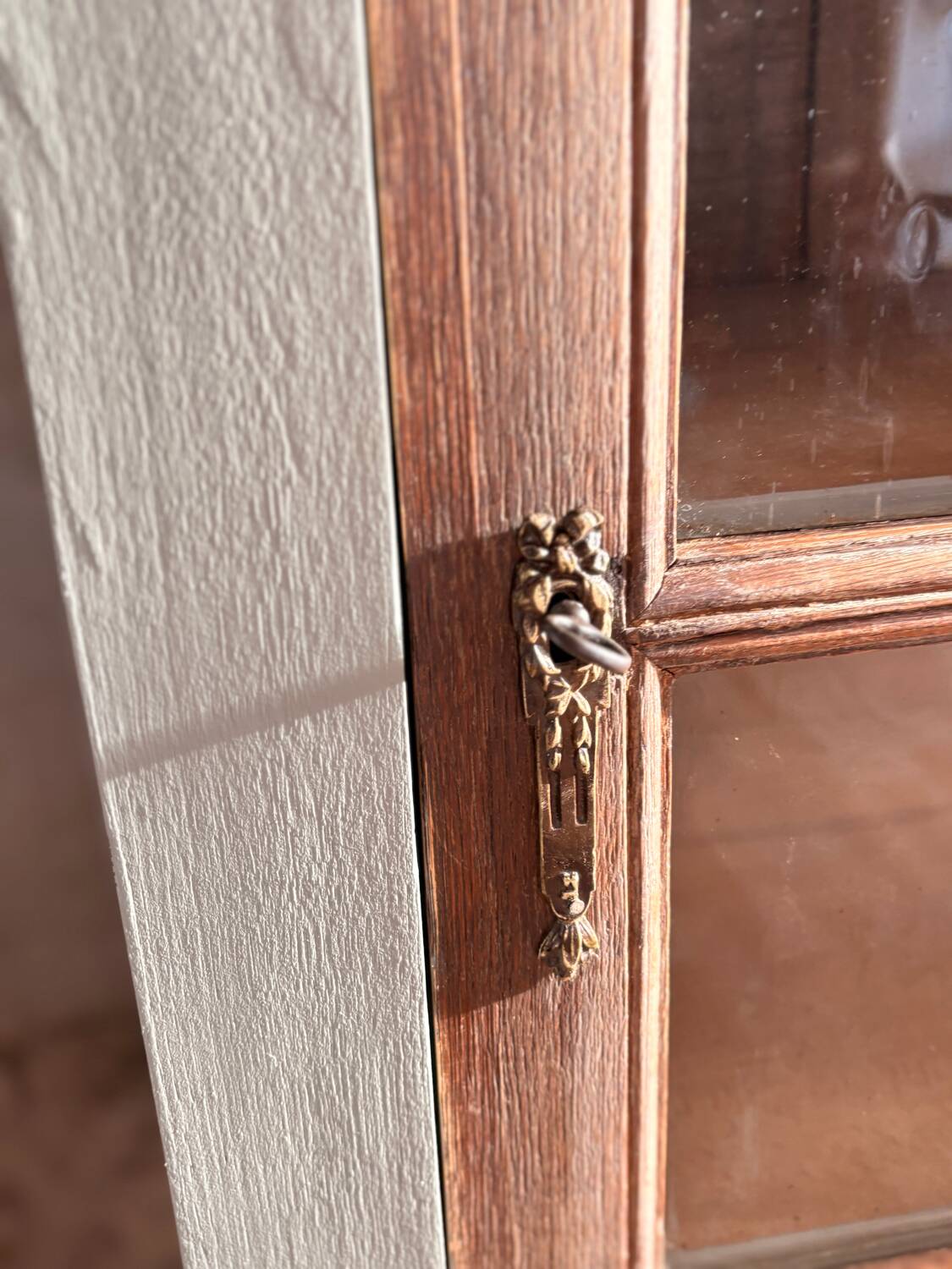 Raw wood and celadon glass cabinet