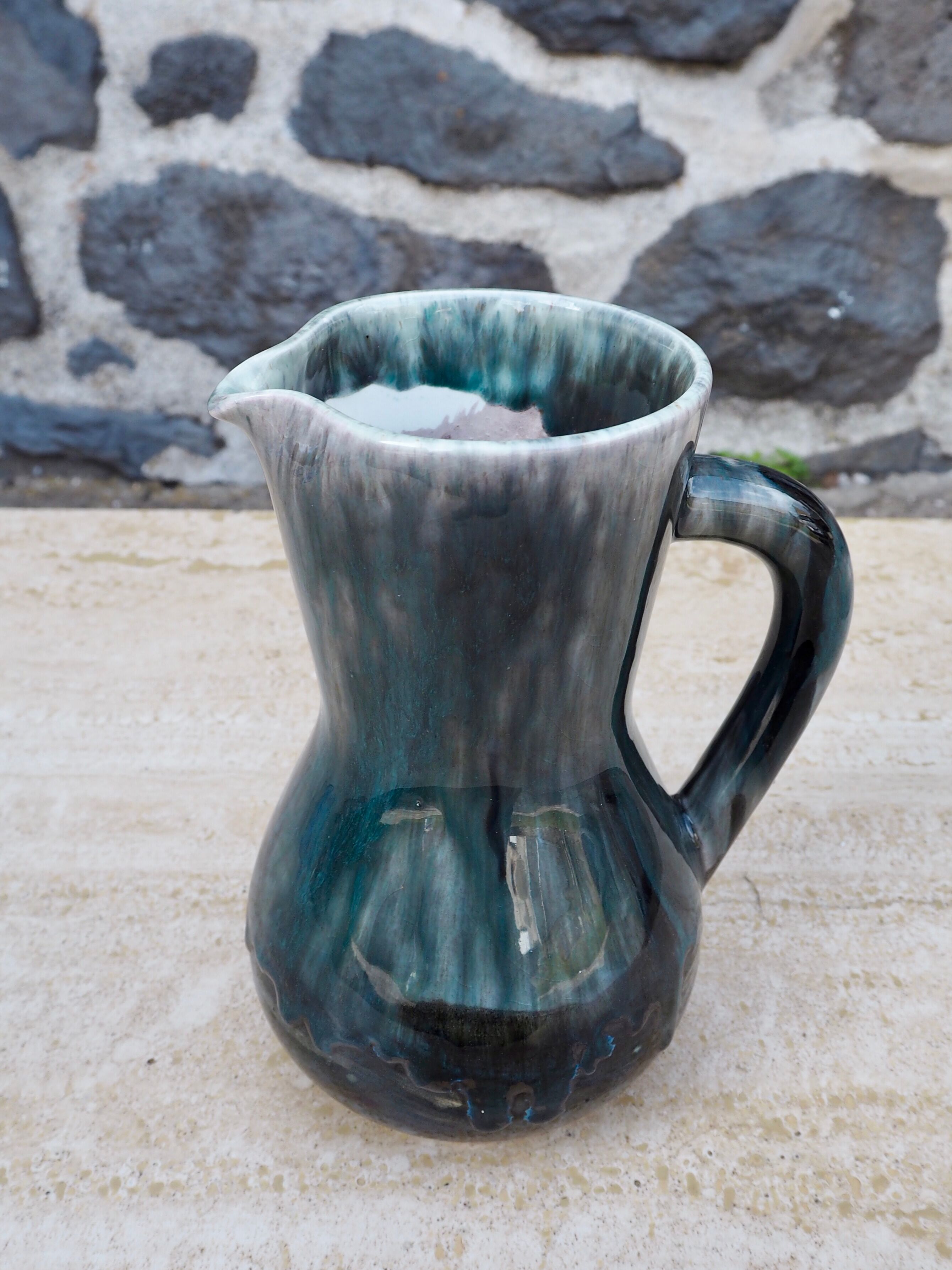 Enamelled ceramic pitcher signed Morvan