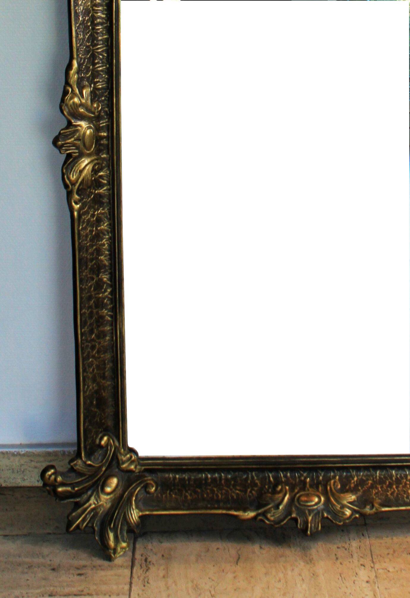 Baroque “trumeaux” mirror in carved solid wood.
