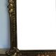 Baroque “trumeaux” mirror in carved solid wood.