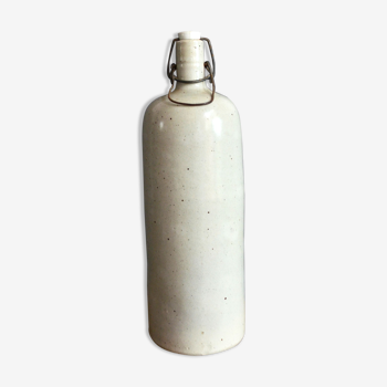 Large speckled sandstone bottle