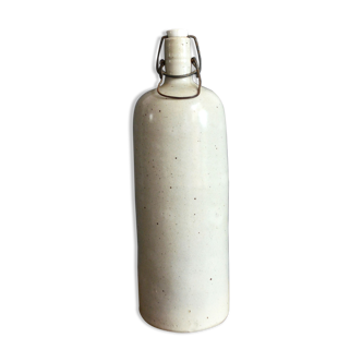 Large speckled sandstone bottle