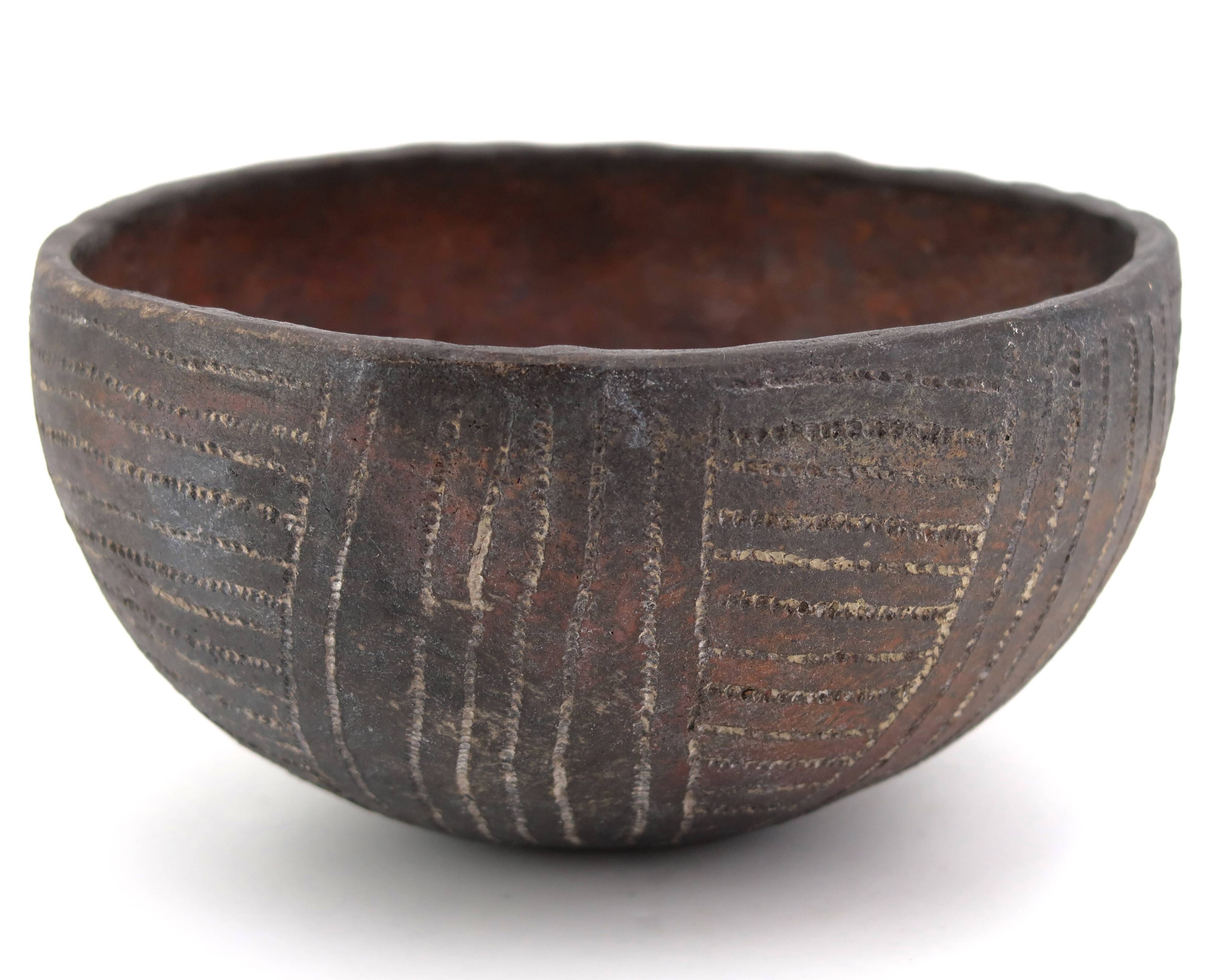 Empty tumbler pocket in ceramic by Brigitte Marionneau