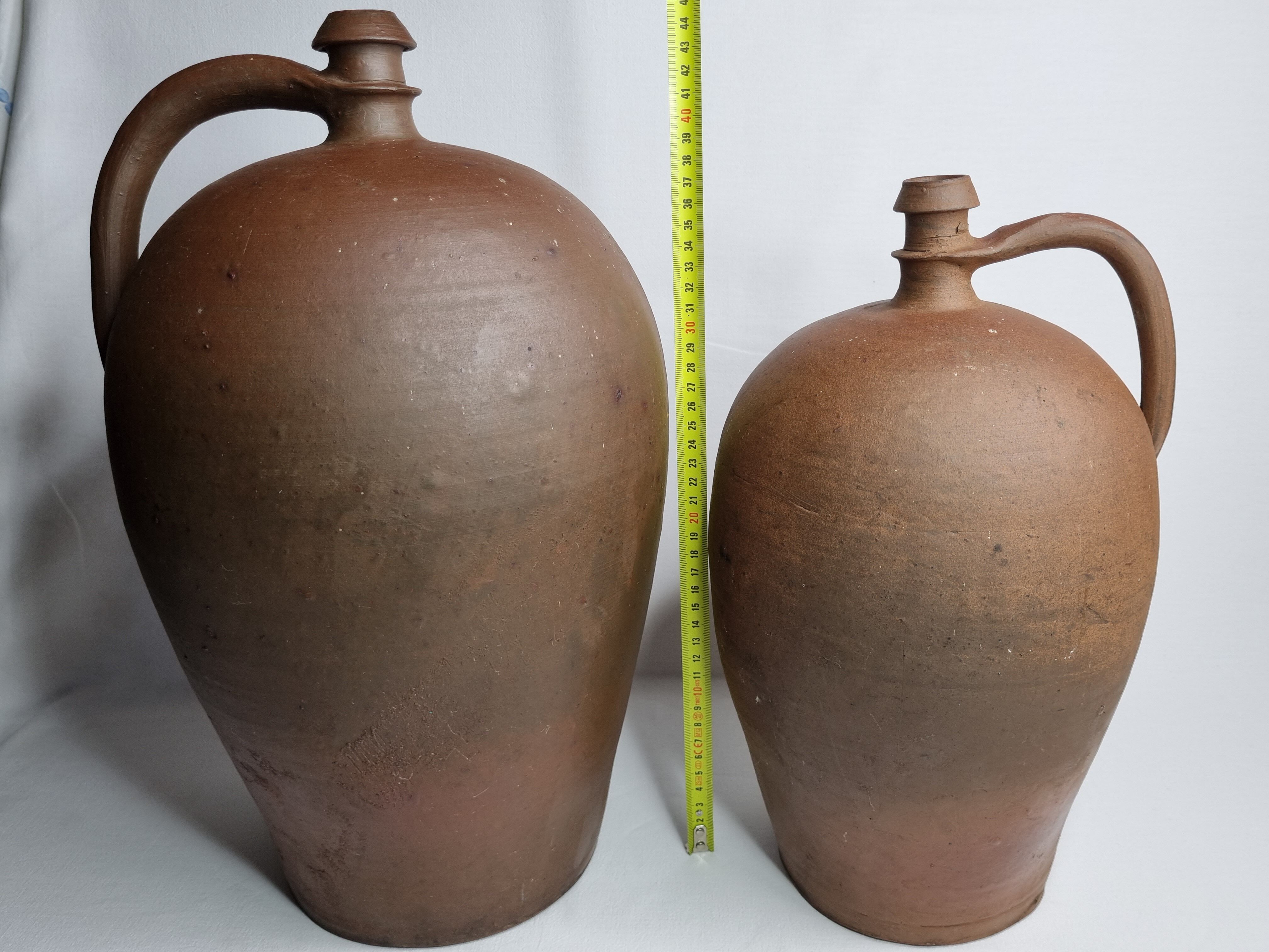 Pair of terracotta ladies-jeannes, 44 cm