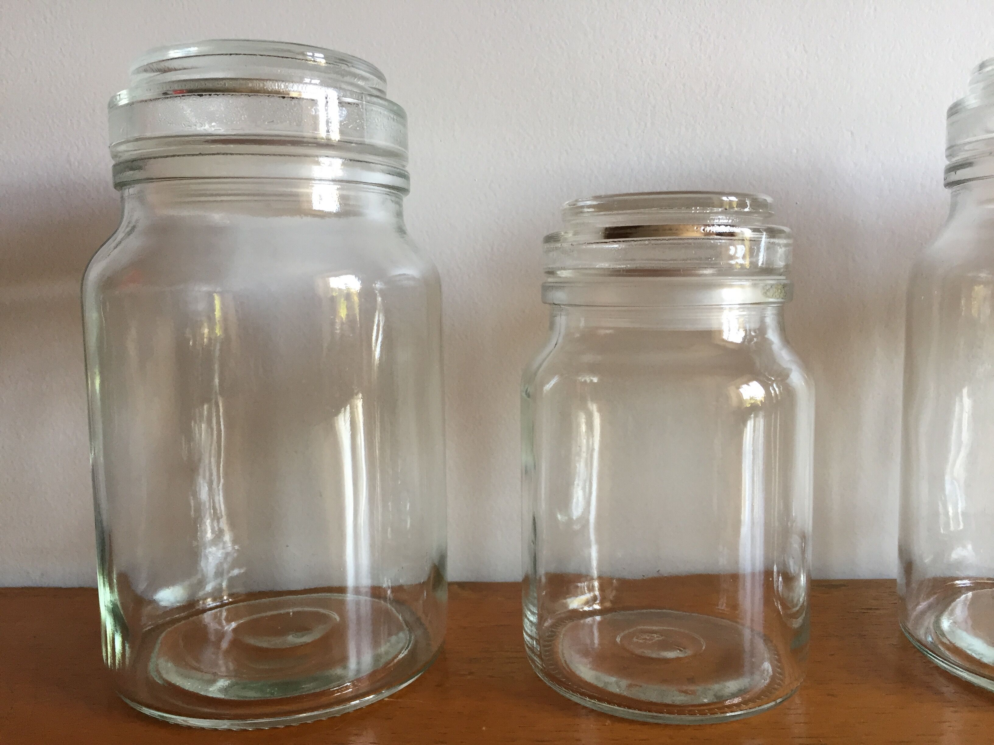 Lot of 4 vintage glass jars