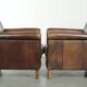 Characterful set of two sheepskin design armchairs with beautiful patina