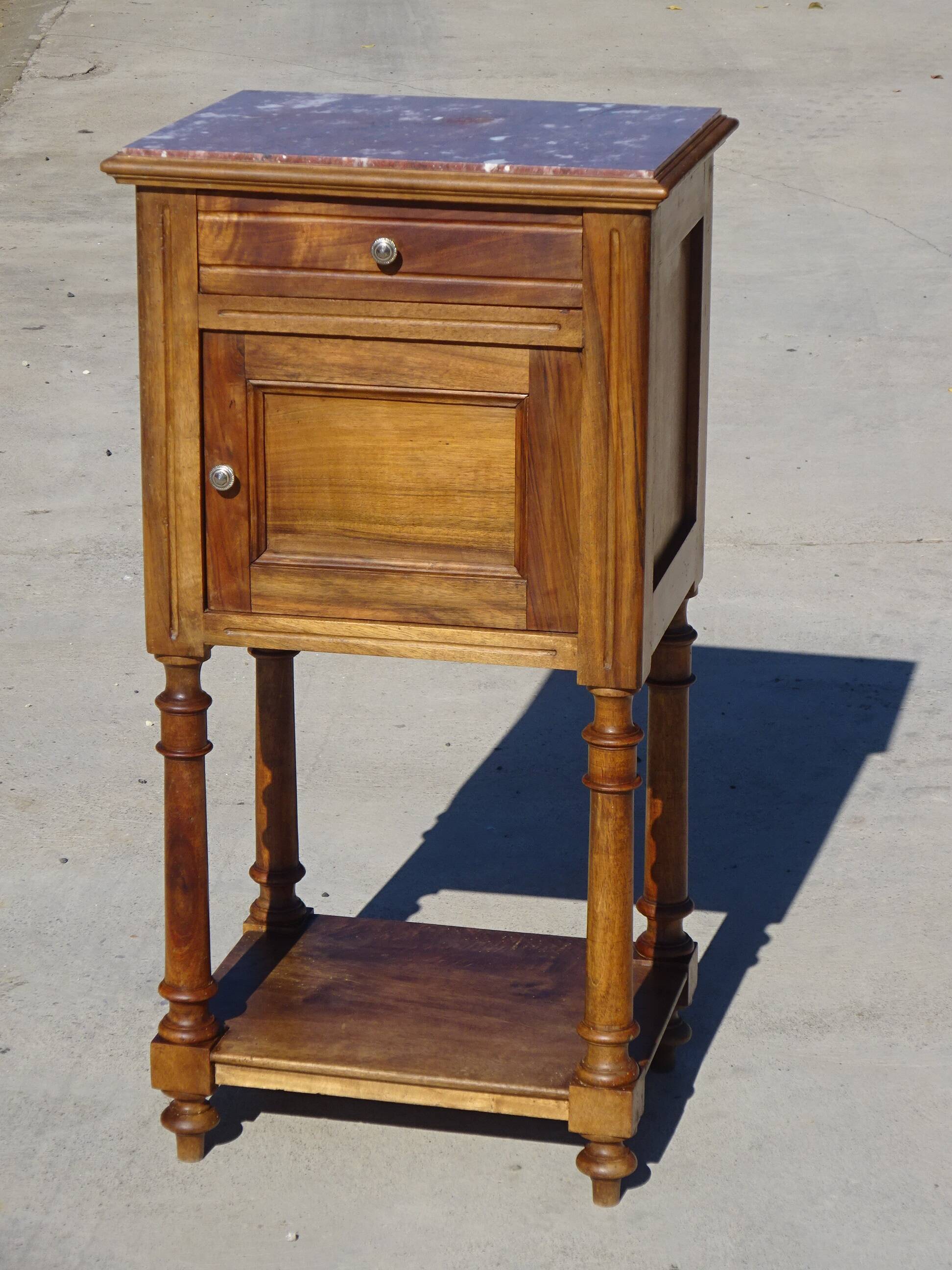 Antique Louis XVI style bedside table in walnut, with a marble top.