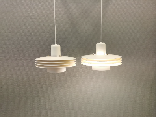Hanging lamps from Danish ES Horn lighting, produced in the 80s.