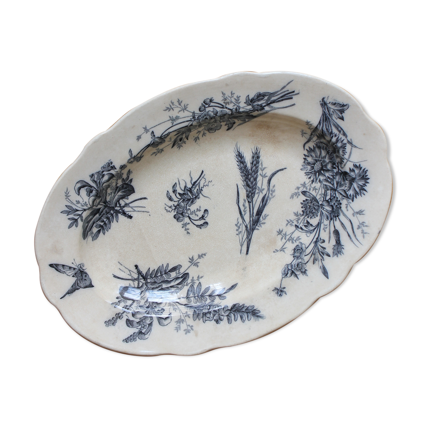 Oval ironstone dish with wheat and butterfly decoration, early 20th century