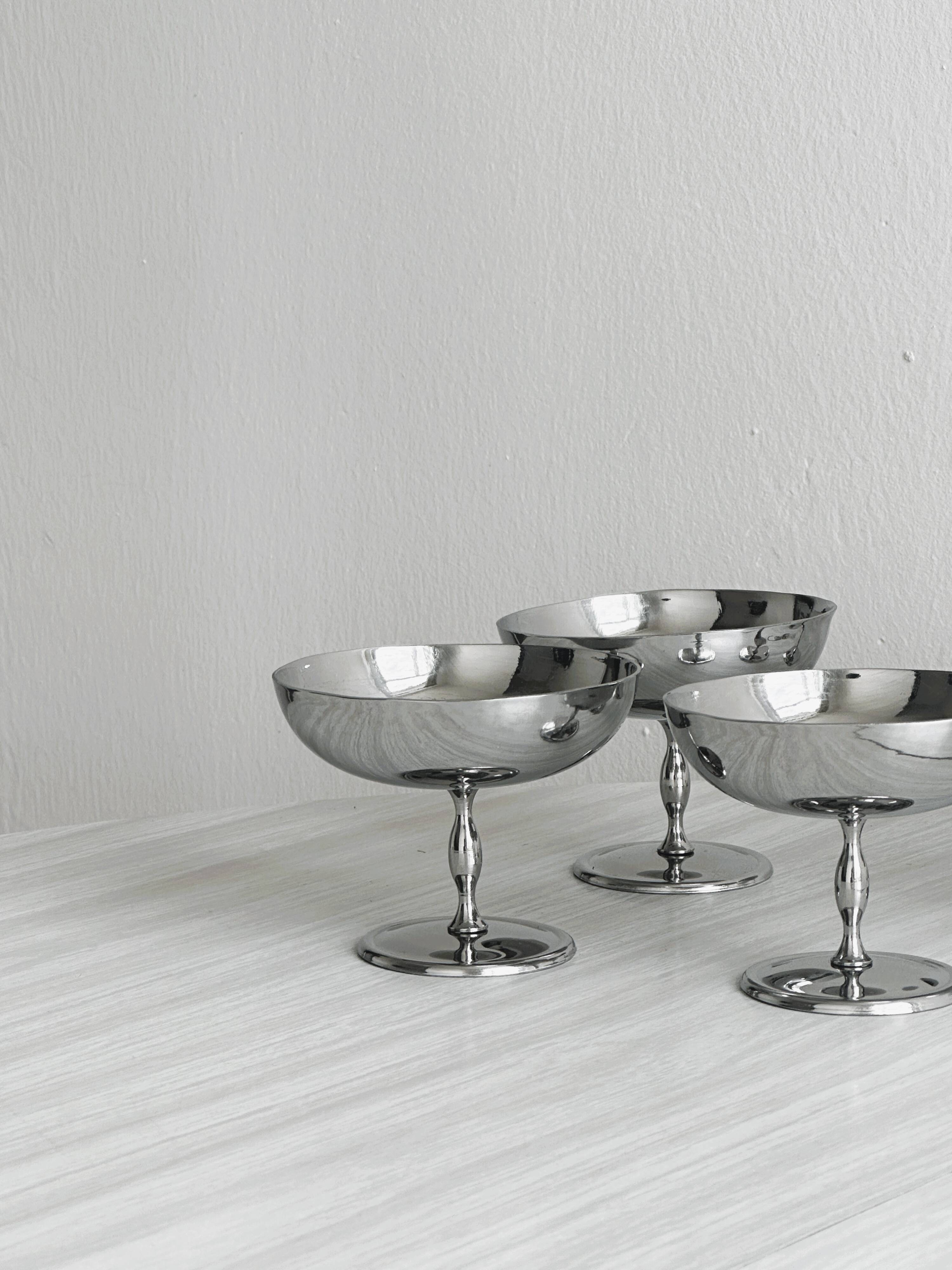 6 shiny stainless steel dessert bowls