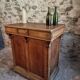 Antique French oak shop counter, kitchen island on wheels, circa 1880–1900.