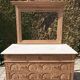 Solid oak chest of drawers with a marble top and original mirror.