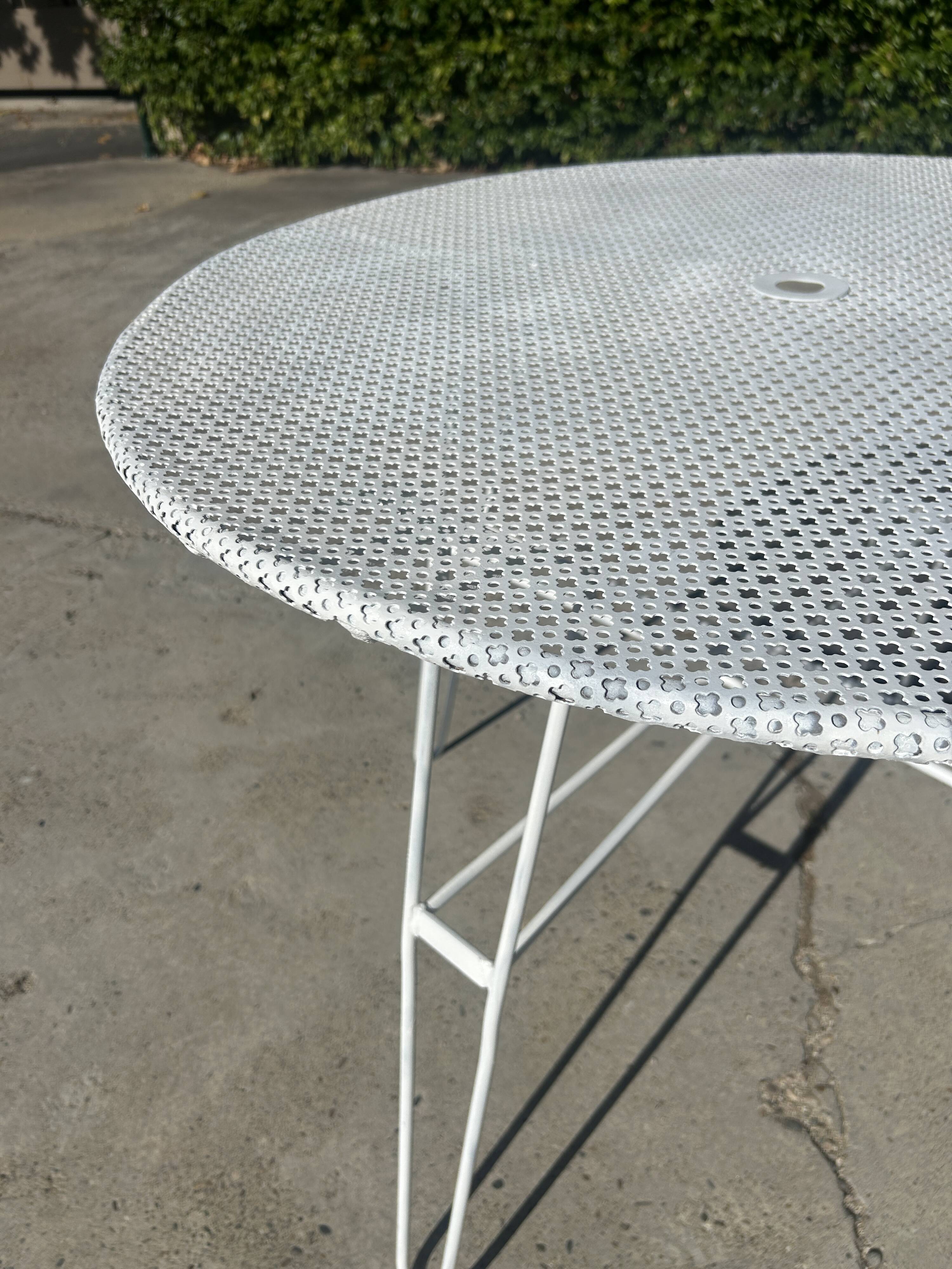 Garden table attributed to Mathieu Mategot from the 1950s.