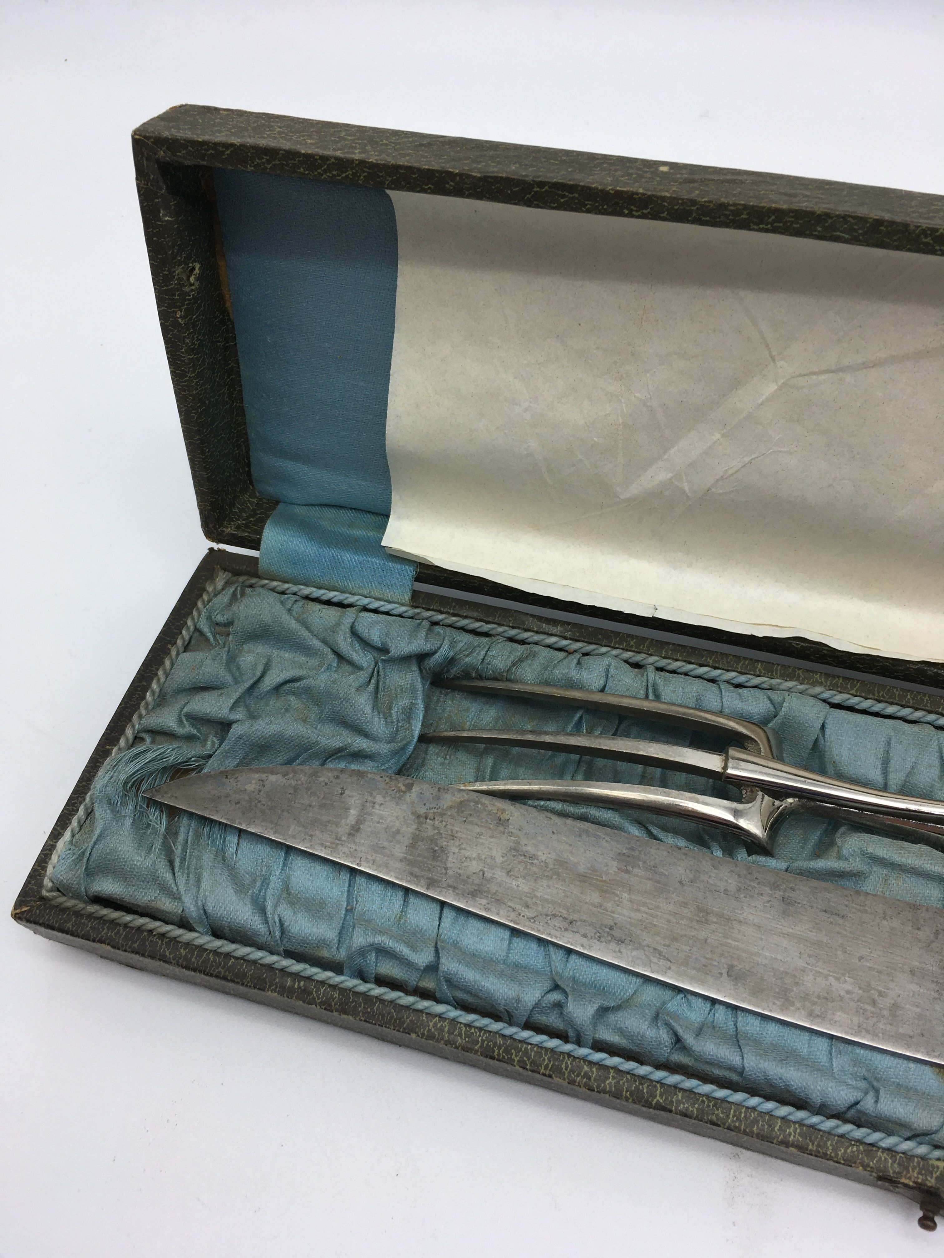 Box of cutlery with leg / roast silver filled.